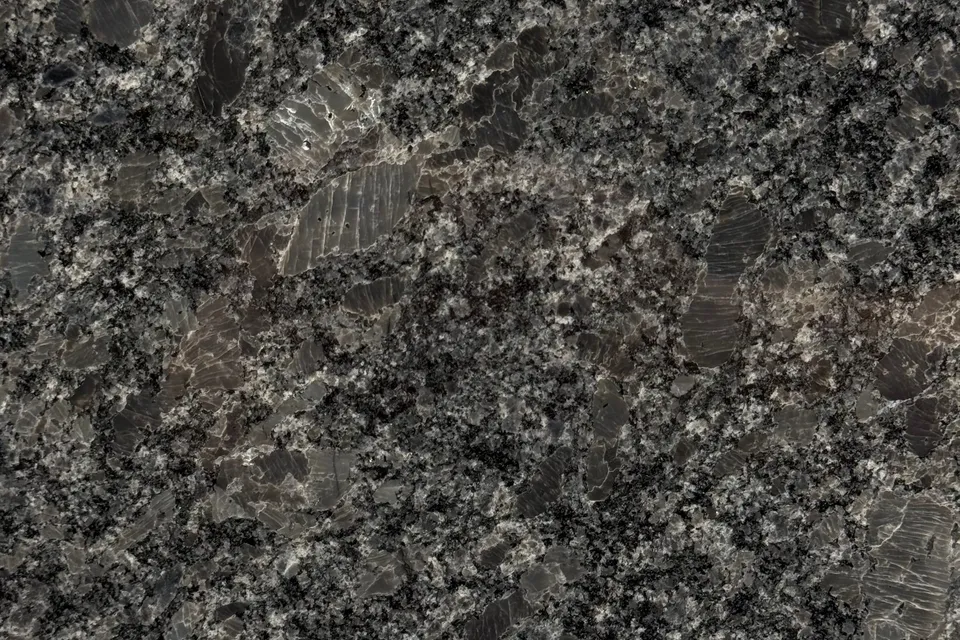 Charcoal granite with coarse black and white grains and large dark crystals